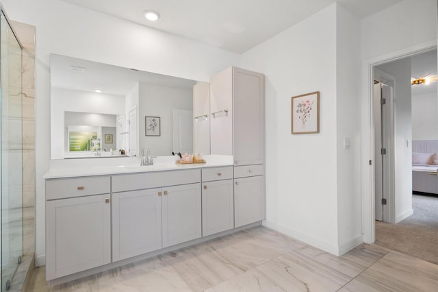 7102 Rockwood Rd, Jupiter, FL 33458 - ensuite bathroom with vanity, baseboards, an enclosed shower, and marble finish flooring
