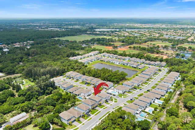 7102 Rockwood Rd, Jupiter, FL 33458 - aerial view of property's location with nearby suburban area and a large body of water