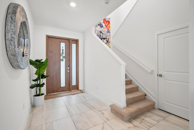 7102 Rockwood Rd, Jupiter, FL 33458 - entrance foyer with marble look tile flooring, stairway, baseboards, and recessed lighting