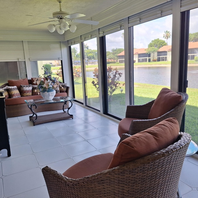 10231 N Circle Lake Dr Unit 101, Boynton Beach, FL 33437 - sunroom with plenty of natural light, a ceiling fan, and a water view