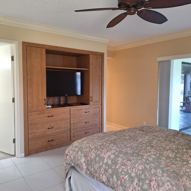 10231 N Circle Lake Dr Unit 101, Boynton Beach, FL 33437 - bedroom with ornamental molding, light tile patterned floors, and a ceiling fan