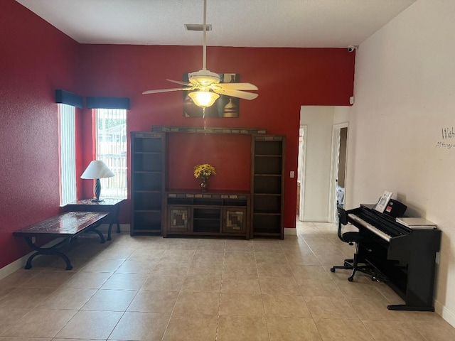 5760 NW Cleburn Dr, Port Saint Lucie, FL 34986 - living area with a ceiling fan, baseboards, and tile patterned flooring