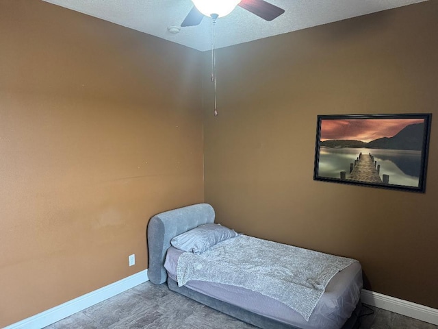 5760 NW Cleburn Dr, Port Saint Lucie, FL 34986 - bedroom featuring baseboards and ceiling fan
