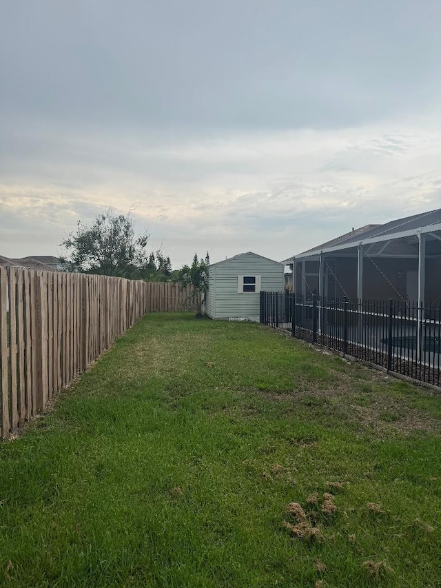 5760 NW Cleburn Dr, Port Saint Lucie, FL 34986 - view of yard featuring a lanai