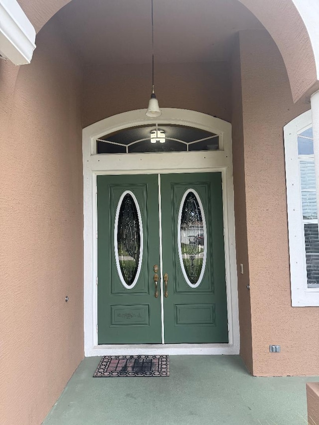 5760 NW Cleburn Dr, Port Saint Lucie, FL 34986 - property entrance featuring stucco siding