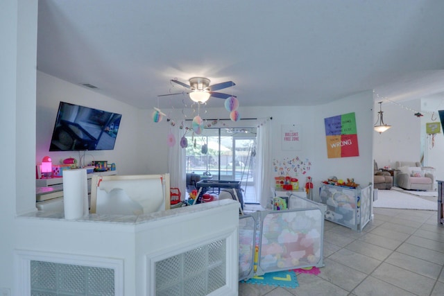1855 Lotus Ln, Wellington, FL 33414 - living area featuring tile patterned flooring and ceiling fan