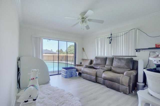 1855 Lotus Ln, Wellington, FL 33414 - living area with ornamental molding, ceiling fan, and wood finished floors