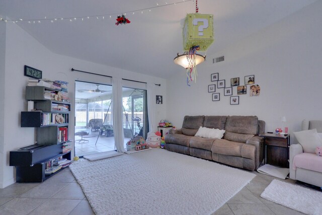 1855 Lotus Ln, Wellington, FL 33414 - living area with tile patterned floors and lofted ceiling