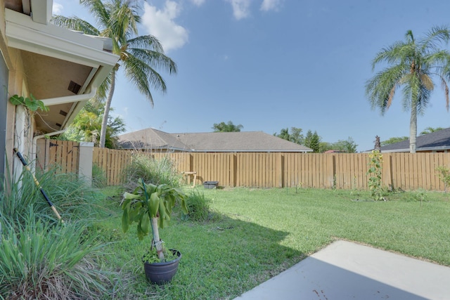 1855 Lotus Ln, Wellington, FL 33414 - view of yard featuring a patio