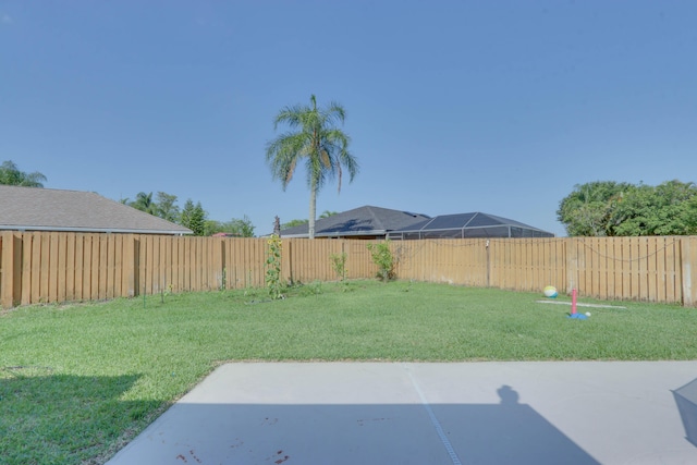 1855 Lotus Ln, Wellington, FL 33414 - view of yard featuring a patio area