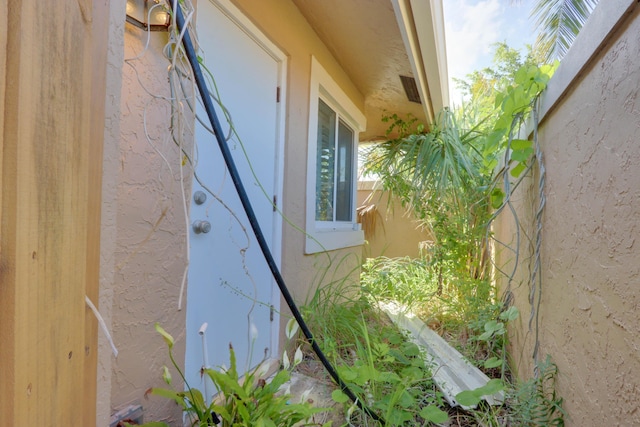 1855 Lotus Ln, Wellington, FL 33414 - exterior view of stucco siding