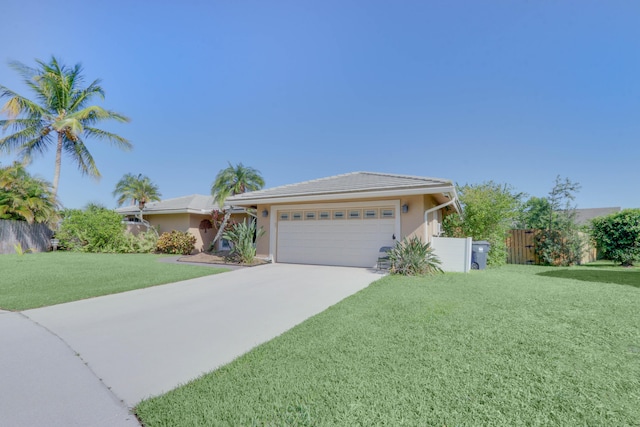 1855 Lotus Ln, Wellington, FL 33414 - ranch-style house with a garage, concrete driveway, and stucco siding