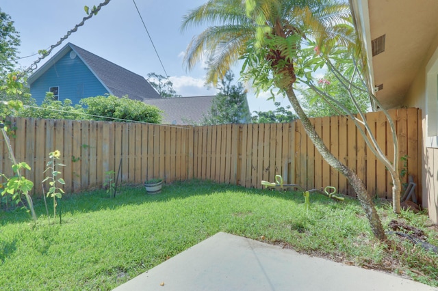 1855 Lotus Ln, Wellington, FL 33414 - view of yard with a patio area