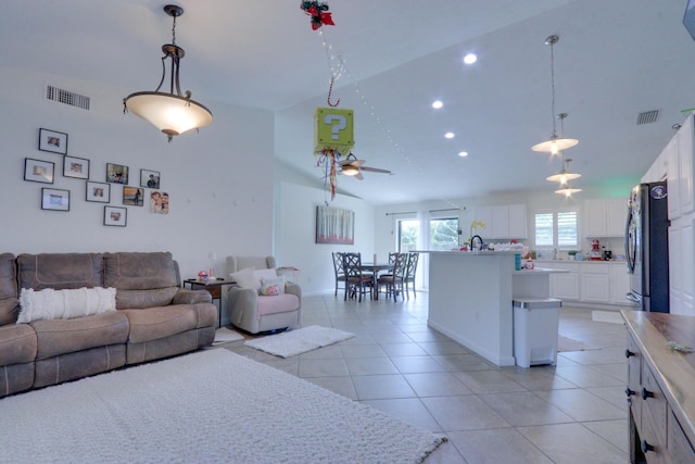 1855 Lotus Ln, Wellington, FL 33414 - living area featuring ceiling fan, light tile patterned flooring, high vaulted ceiling, and recessed lighting