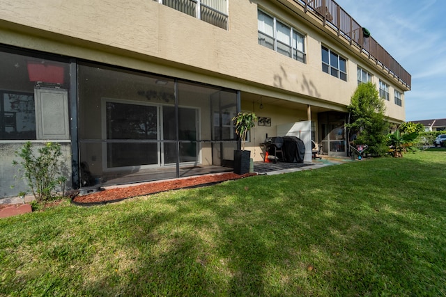 9500 SW 3rd St SW Unit 130, Boca Raton, FL 33428 - back of house with a yard and stucco siding