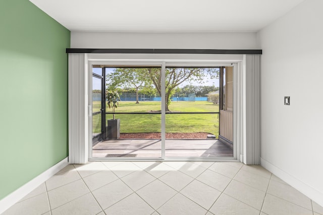 9500 SW 3rd St SW Unit 130, Boca Raton, FL 33428 - entryway with a water view, baseboards, and tile patterned flooring