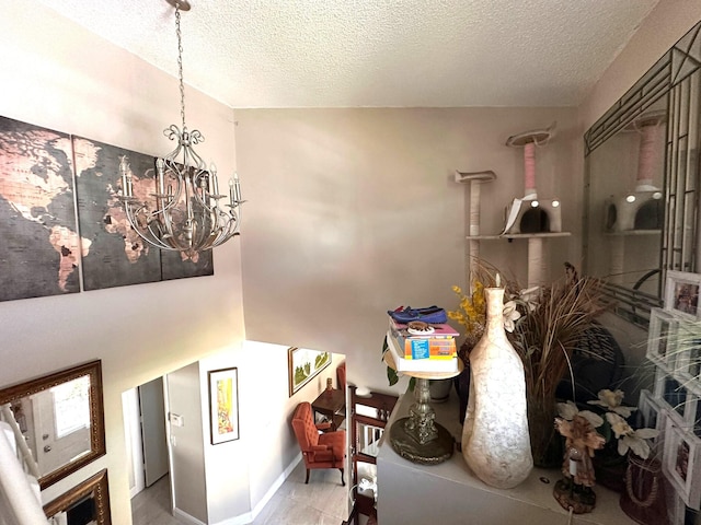 5473 E Berry Blossom Way E, West Palm Beach, FL 33415 - dining room with a chandelier and a textured ceiling
