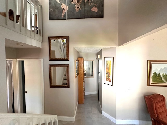 5473 E Berry Blossom Way E, West Palm Beach, FL 33415 - hallway featuring baseboards