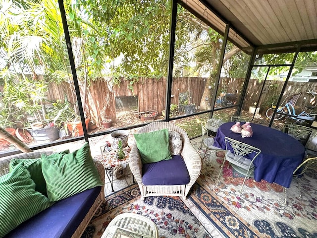 5473 E Berry Blossom Way E, West Palm Beach, FL 33415 - sunroom featuring outdoor lounge area