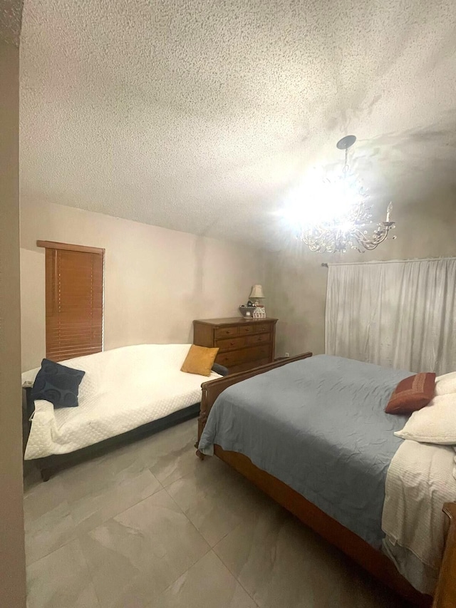 5473 E Berry Blossom Way E, West Palm Beach, FL 33415 - bedroom with a textured ceiling