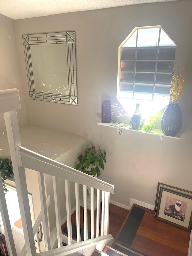 5473 E Berry Blossom Way E, West Palm Beach, FL 33415 - stairs with wood finished floors and baseboards
