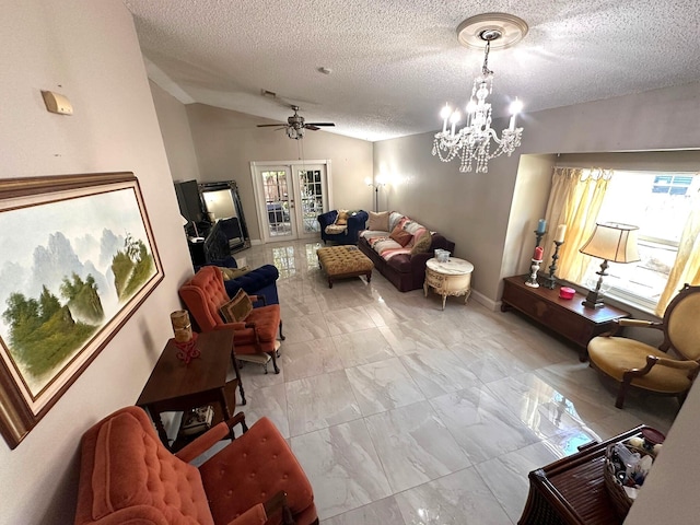 5473 E Berry Blossom Way E, West Palm Beach, FL 33415 - living room featuring light marble finish floors, vaulted ceiling, ceiling fan, a textured ceiling, and a chandelier