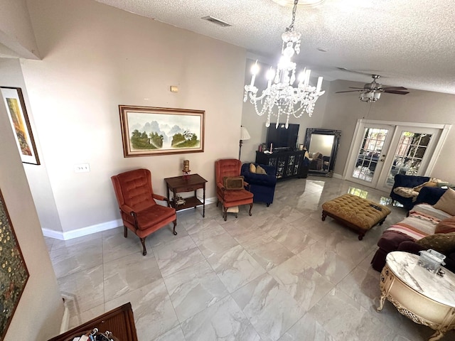 5473 E Berry Blossom Way E, West Palm Beach, FL 33415 - living area with a textured ceiling, a ceiling fan, a chandelier, light marble finish flooring, and baseboards