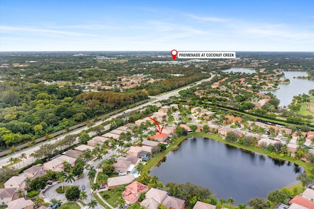 3769 Pebblebrook Ct, Coconut Creek, FL 33073 - aerial view of residential area with a nearby body of water