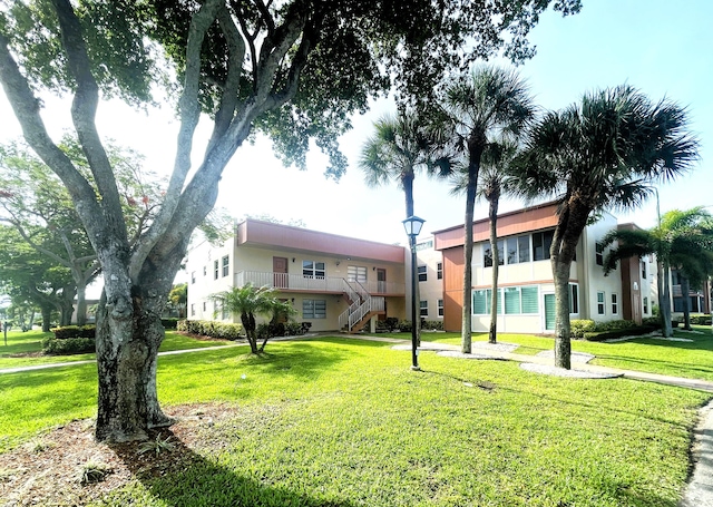 222 Piedmont E, Delray Beach, FL 33484 - surrounding community with a lawn