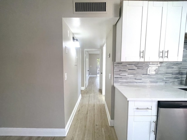 222 Piedmont E, Delray Beach, FL 33484 - corridor featuring light wood-type flooring and baseboards