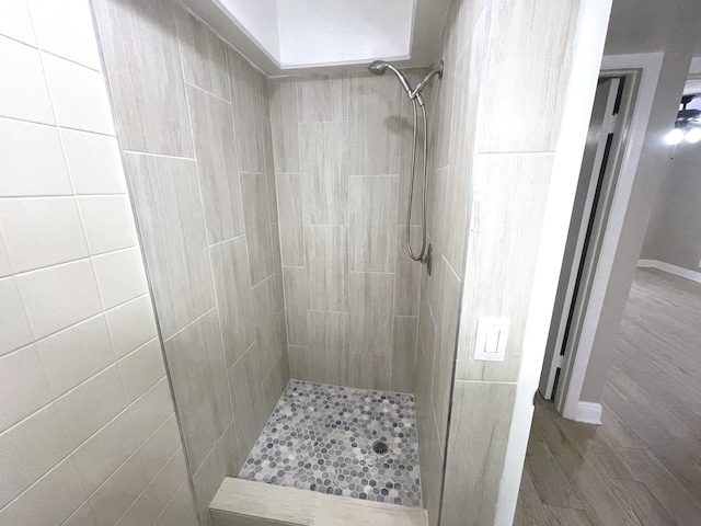 222 Piedmont E, Delray Beach, FL 33484 - bathroom with tiled shower and wood finished floors