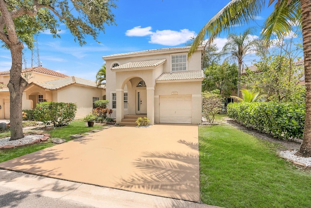 5814 Eagle Cay Ln, Coconut Creek, FL 33073 - mediterranean / spanish home featuring stucco siding, a tiled roof, driveway, a front yard, and a garage