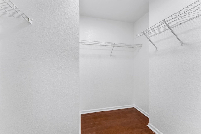 5814 Eagle Cay Ln, Coconut Creek, FL 33073 - walk in closet featuring wood finished floors