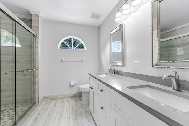 5814 Eagle Cay Ln, Coconut Creek, FL 33073 - full bathroom with double vanity, toilet, a stall shower, and baseboards