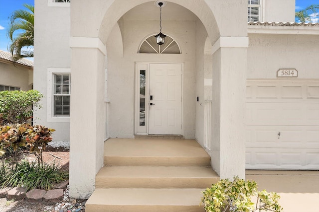 5814 Eagle Cay Ln, Coconut Creek, FL 33073 - entrance to property with stucco siding and a garage