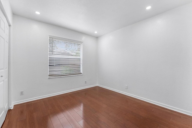 5814 Eagle Cay Ln, Coconut Creek, FL 33073 - unfurnished room featuring dark wood finished floors, baseboards, and recessed lighting