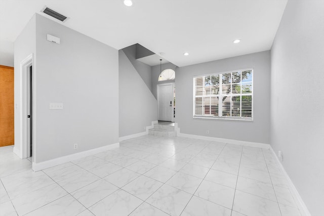 5814 Eagle Cay Ln, Coconut Creek, FL 33073 - unfurnished living room with recessed lighting and baseboards