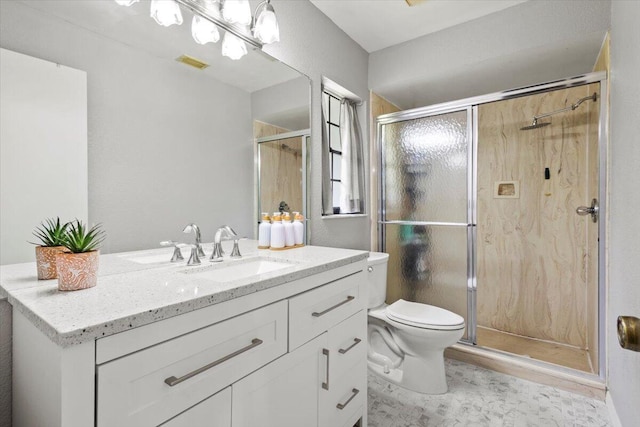 5706 Eagle Dr, Fort Pierce, FL 34950 - bathroom featuring vanity, toilet, and a shower stall