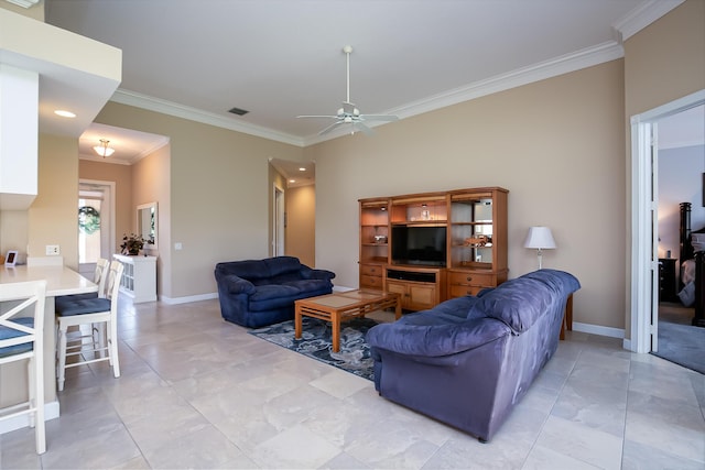 10581 SW Stratton Dr, Port Saint Lucie, FL 34987 - living room with crown molding, ceiling fan, baseboards, light tile patterned flooring, and recessed lighting