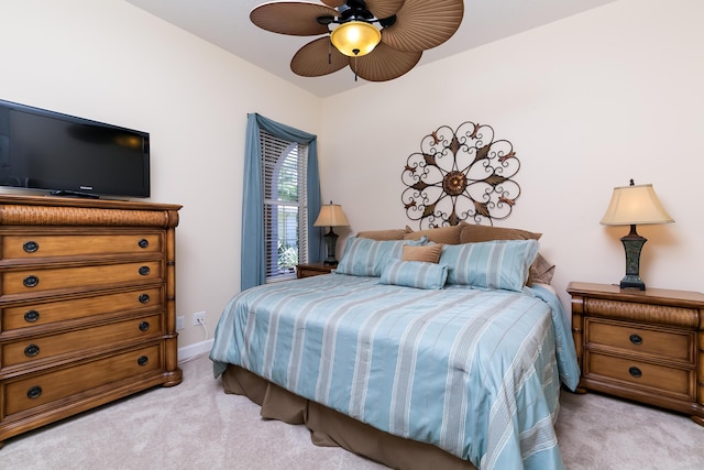 10581 SW Stratton Dr, Port Saint Lucie, FL 34987 - bedroom with light colored carpet and a ceiling fan