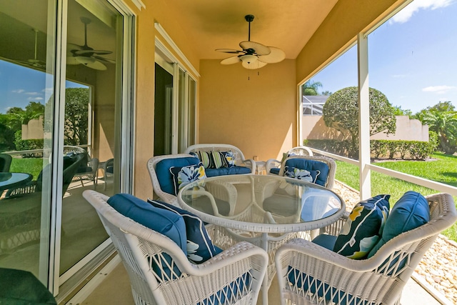 10581 SW Stratton Dr, Port Saint Lucie, FL 34987 - sunroom with ceiling fan, outdoor dining space, and vaulted ceiling