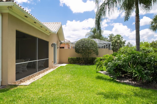 10581 SW Stratton Dr, Port Saint Lucie, FL 34987 - view of yard with glass enclosure