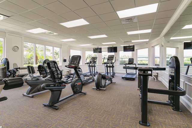 10581 SW Stratton Dr, Port Saint Lucie, FL 34987 - exercise room with carpet and a paneled ceiling