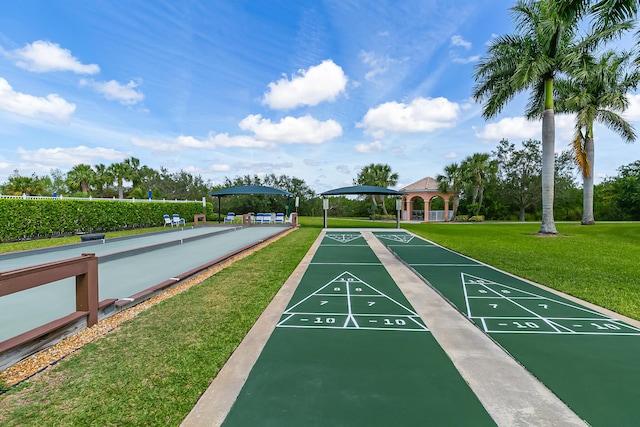 10581 SW Stratton Dr, Port Saint Lucie, FL 34987 - surrounding community featuring a gazebo, a lawn, and shuffleboard