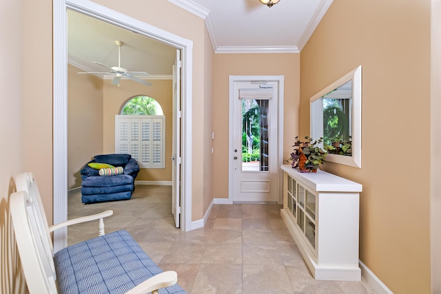 10581 SW Stratton Dr, Port Saint Lucie, FL 34987 - foyer with ornamental molding, ceiling fan, and baseboards
