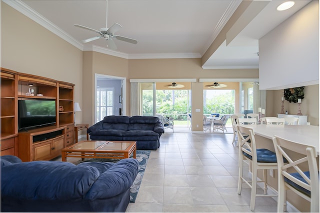 10581 SW Stratton Dr, Port Saint Lucie, FL 34987 - living area featuring a ceiling fan, ornamental molding, healthy amount of natural light, and light tile patterned flooring