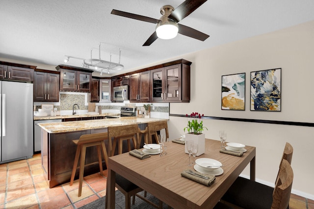 202 2nd Ct, Palm Beach Gardens, FL 33410 - dining room with ceiling fan