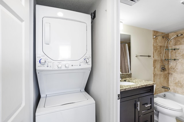 200 Ocean Trail Way Unit 106, Jupiter, FL 33477 - laundry area with stacked washer / drying machine
