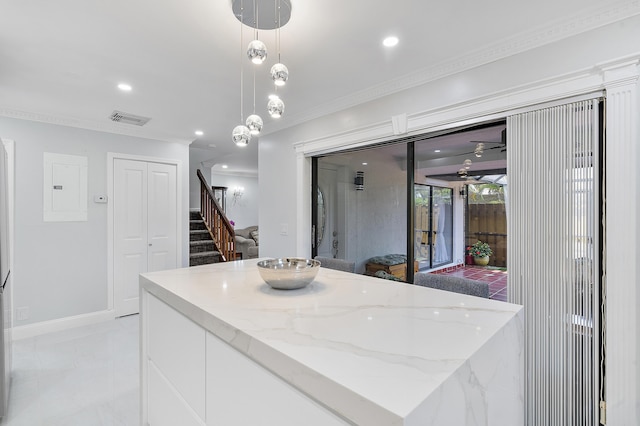 7678 Courtyard Run W, Boca Raton, FL 33433 - kitchen featuring electric panel, white cabinets, decorative light fixtures, crown molding, and recessed lighting