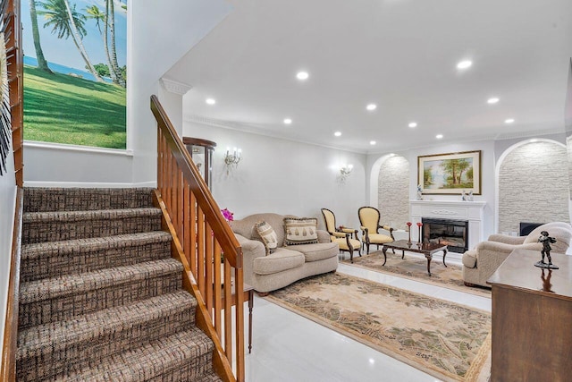 7678 Courtyard Run W, Boca Raton, FL 33433 - living area featuring arched walkways, crown molding, recessed lighting, stairs, and a fireplace